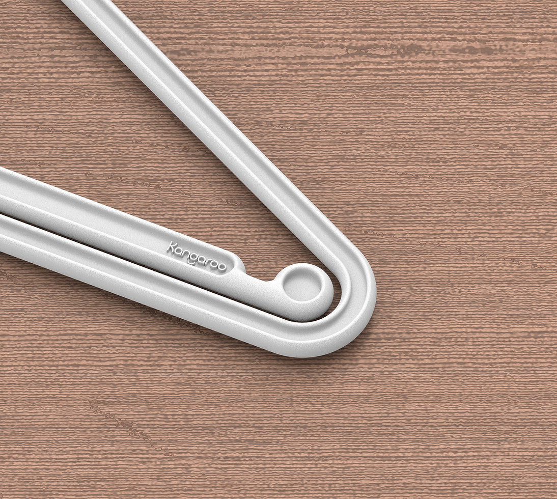 Kangaroo logo detail on an oat milk white hanger